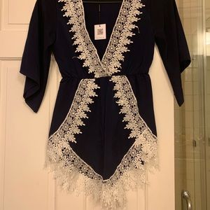 Navy with white lace deep V romper